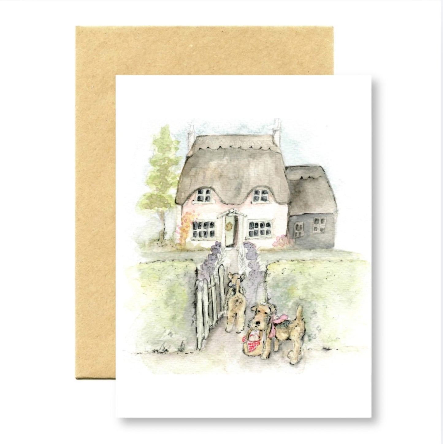 Greeting card with a illustration of a thatched cottage and dogs on a white background