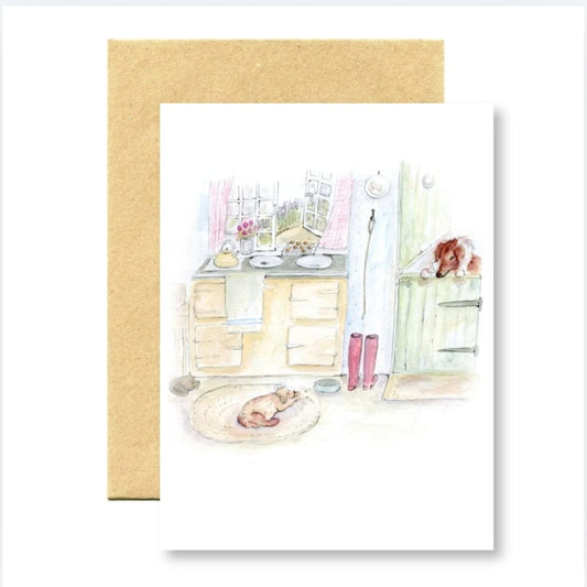 Illustrated kitchen scene with a cat and a dog, framed by a gold border.